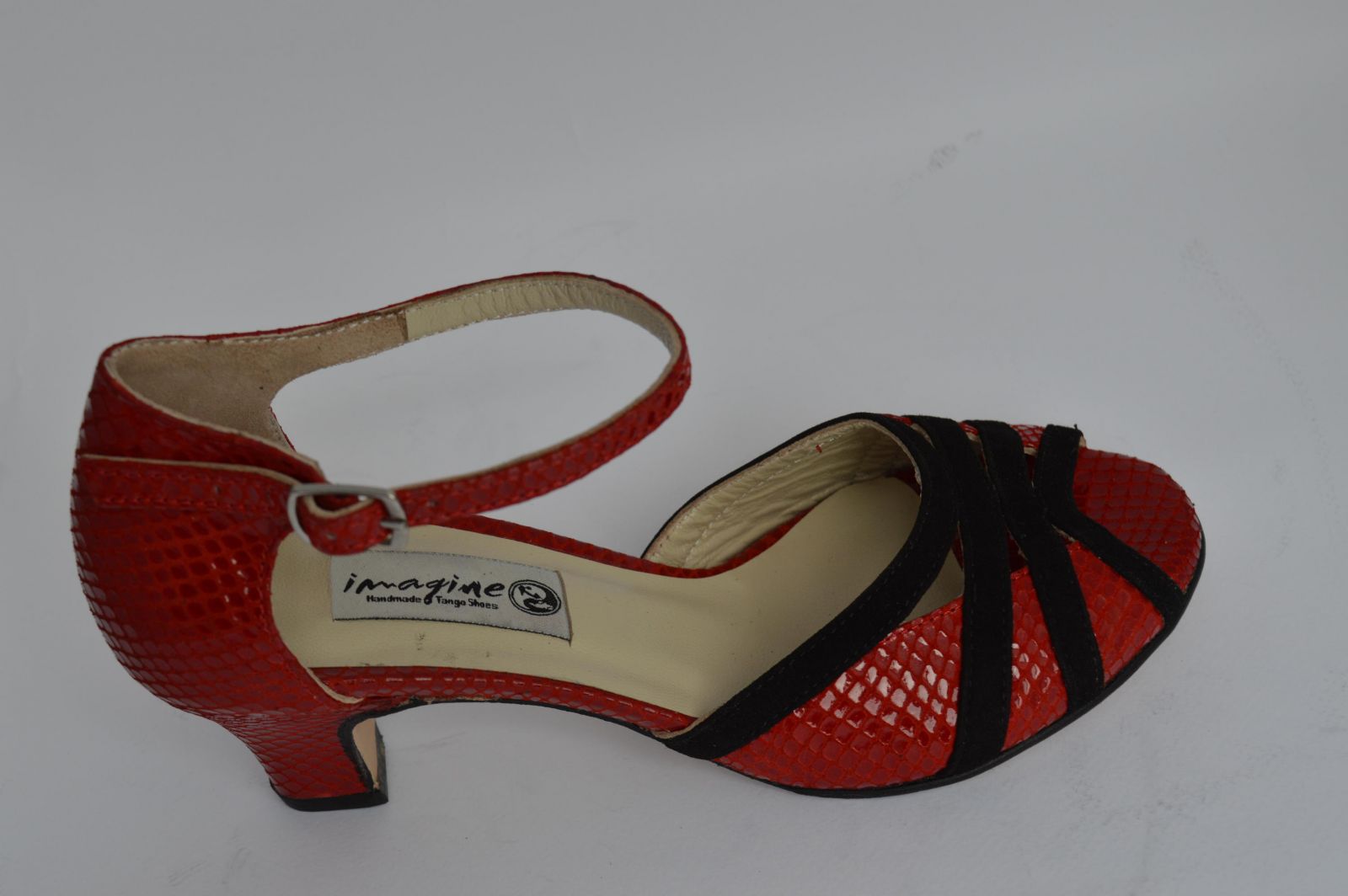Women's Tango Shoe, peep toe style, with impressive red snake leather and black suede
