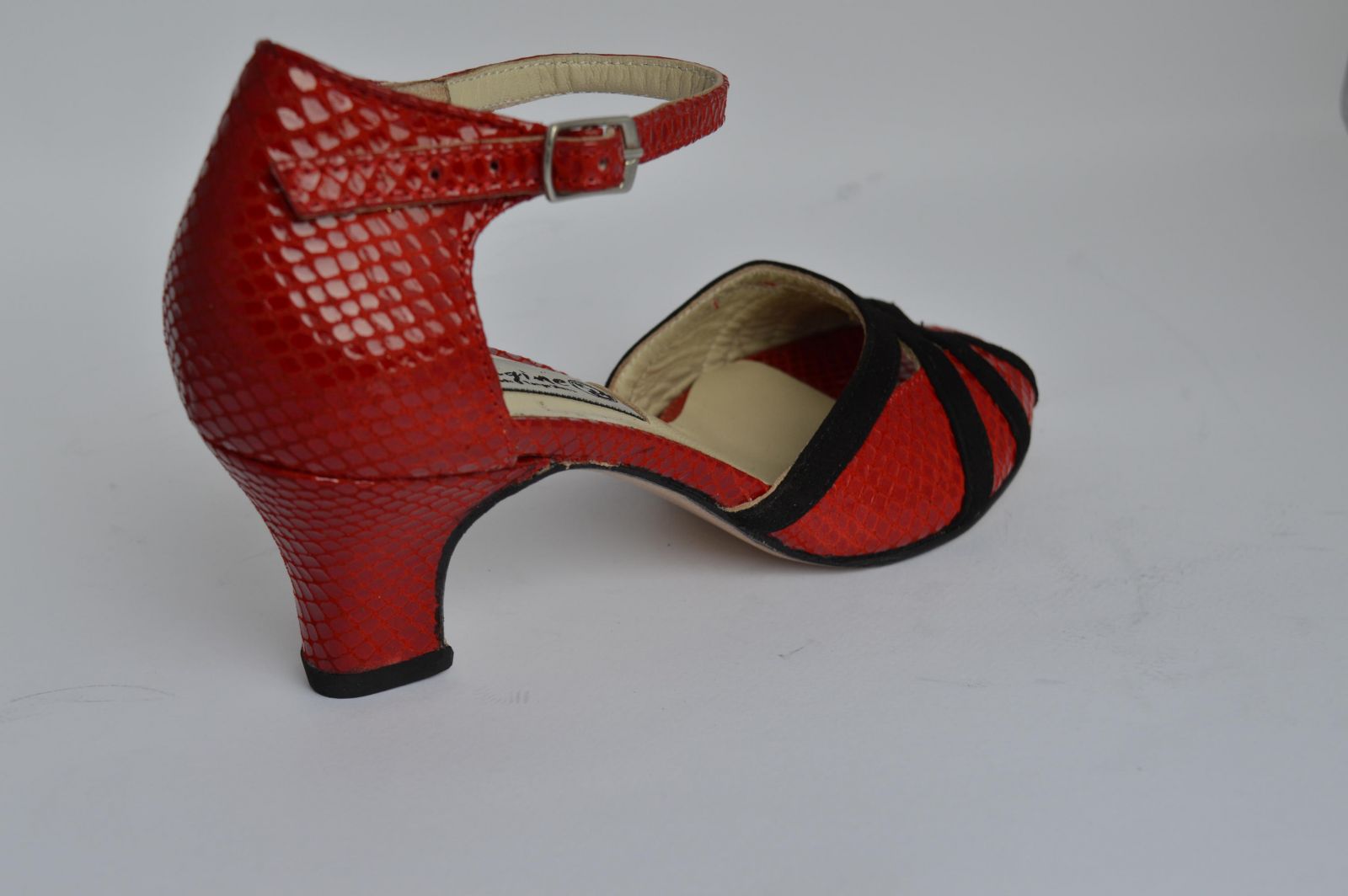 Women's Tango Shoe, peep toe style, with impressive red snake leather and black suede